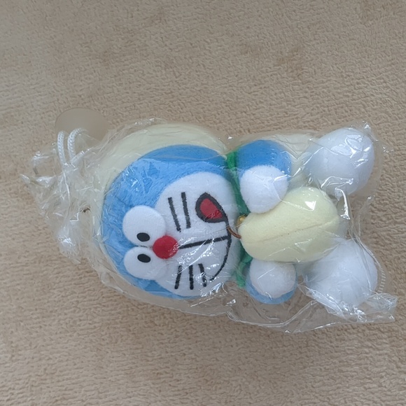 Doraemon holding a pear - car window accessory - Picture 1 of 3